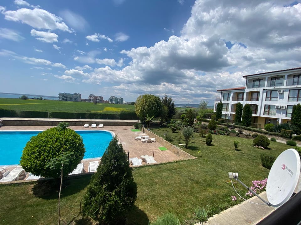 Property building, Spring, Day, Natural landscape, Garden, Garden view, Pool view, Swimming pool