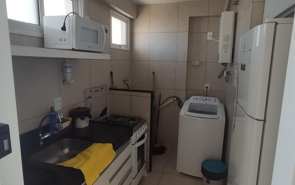 Kitchen or kitchenette, washing machine