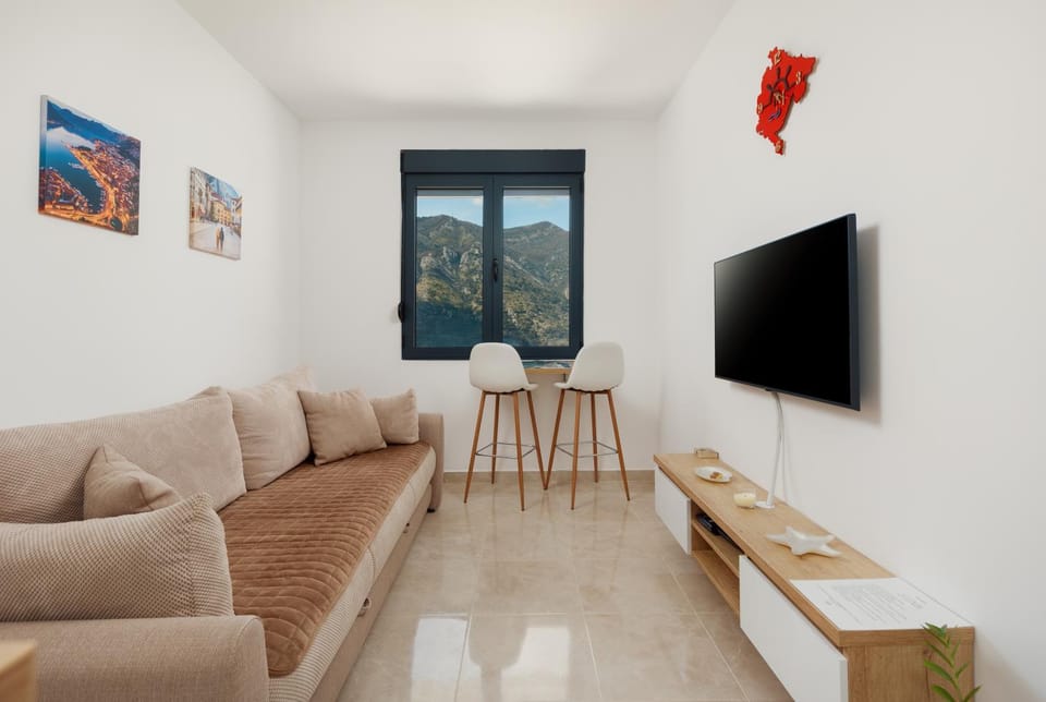 TV and multimedia, View (from property/room), Living room, Mountain view, Sea view
