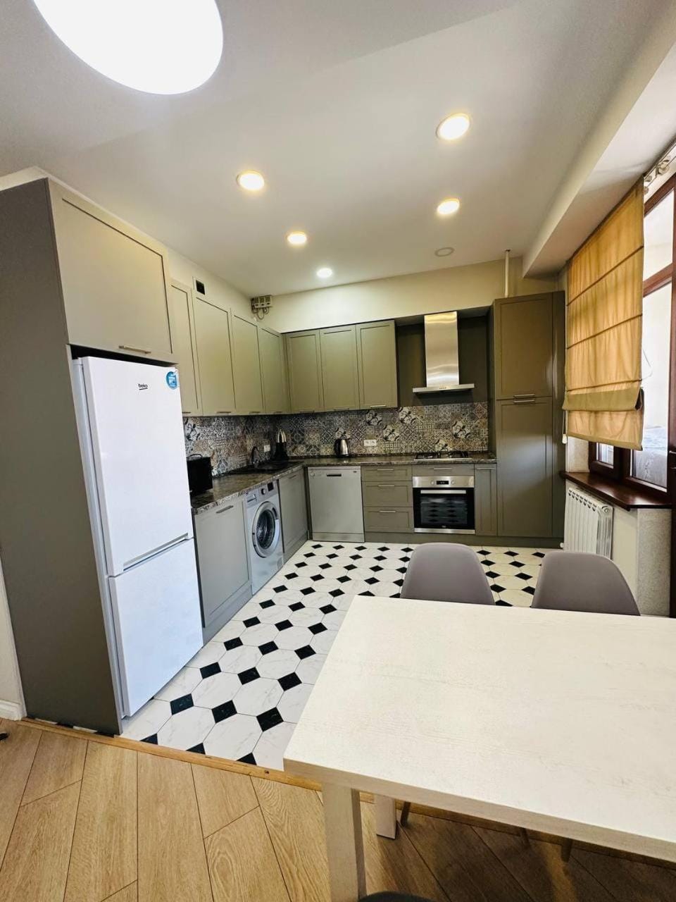 Kitchen or kitchenette, microwave, stove, washing machine, kitchen