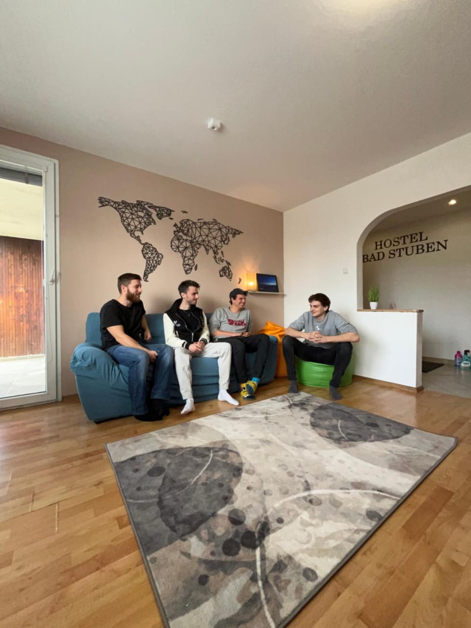 Communal lounge/ TV room, People, Living room, Seating area, group of guests