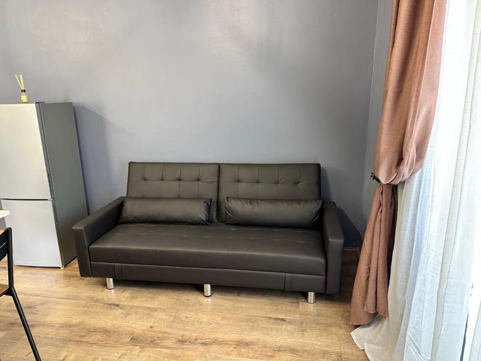 Bed, Living room, Seating area