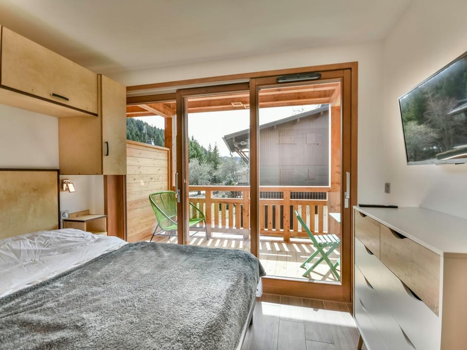Le Génépi - Superbe T2 cabine 4-6 pers, neuf, à 50m des pistes, avec balcon, garage et WiFi Cabin in Les Gets
