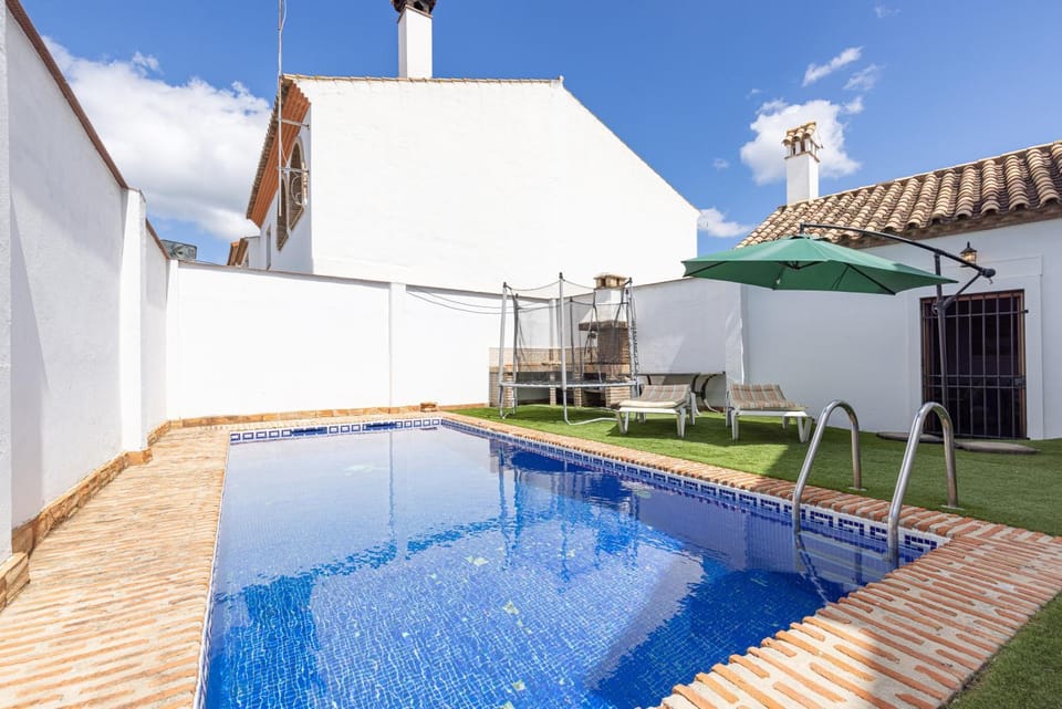 Property building, Living room, Swimming pool