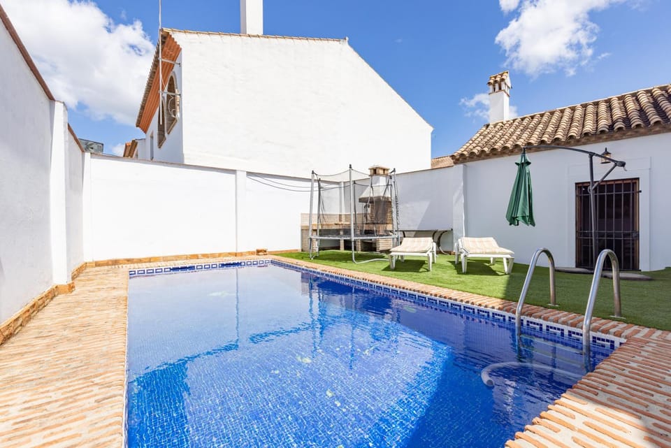 Property building, Living room, Swimming pool