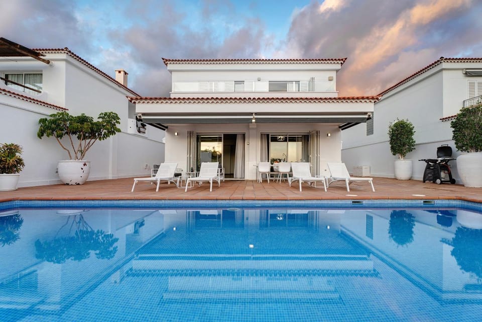 Property building, Living room, Swimming pool