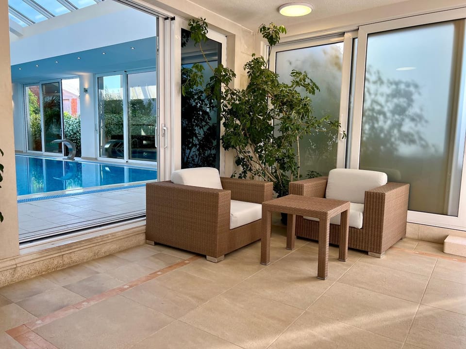 Patio, Seating area, Pool view, Swimming pool