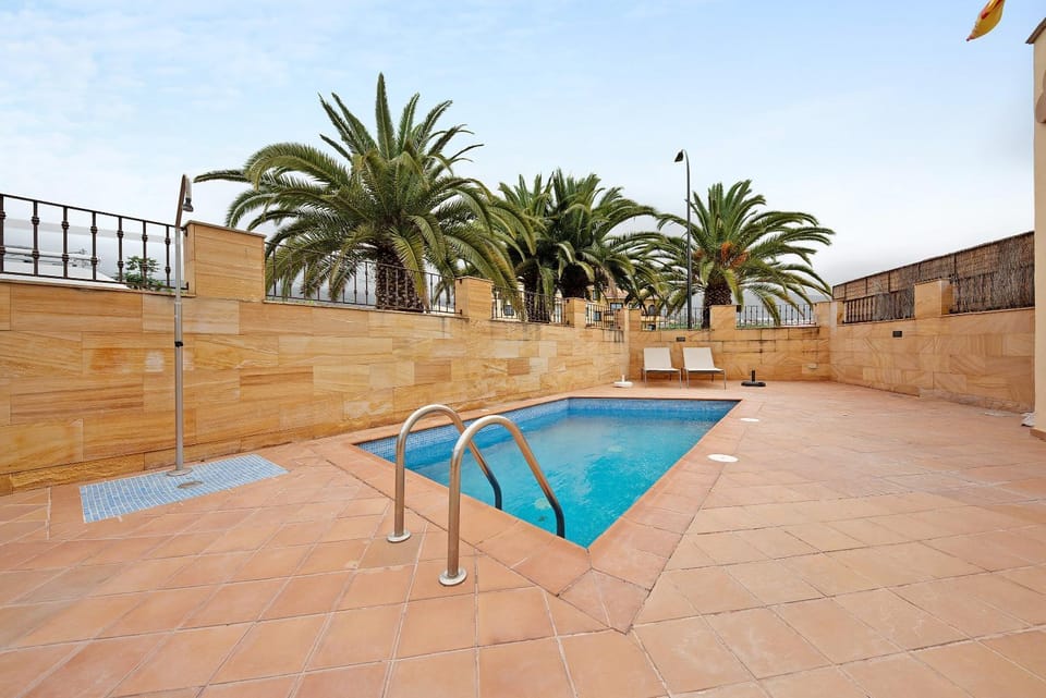 Property building, Living room, Swimming pool