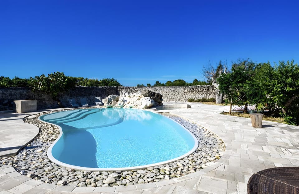 Property building, Living room, Swimming pool