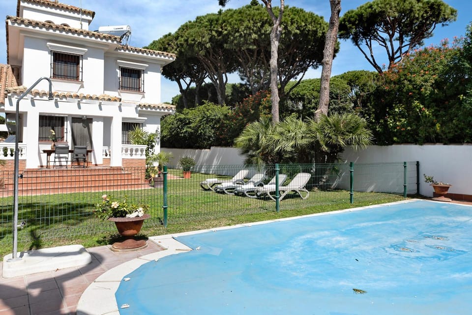 Property building, Living room, Swimming pool