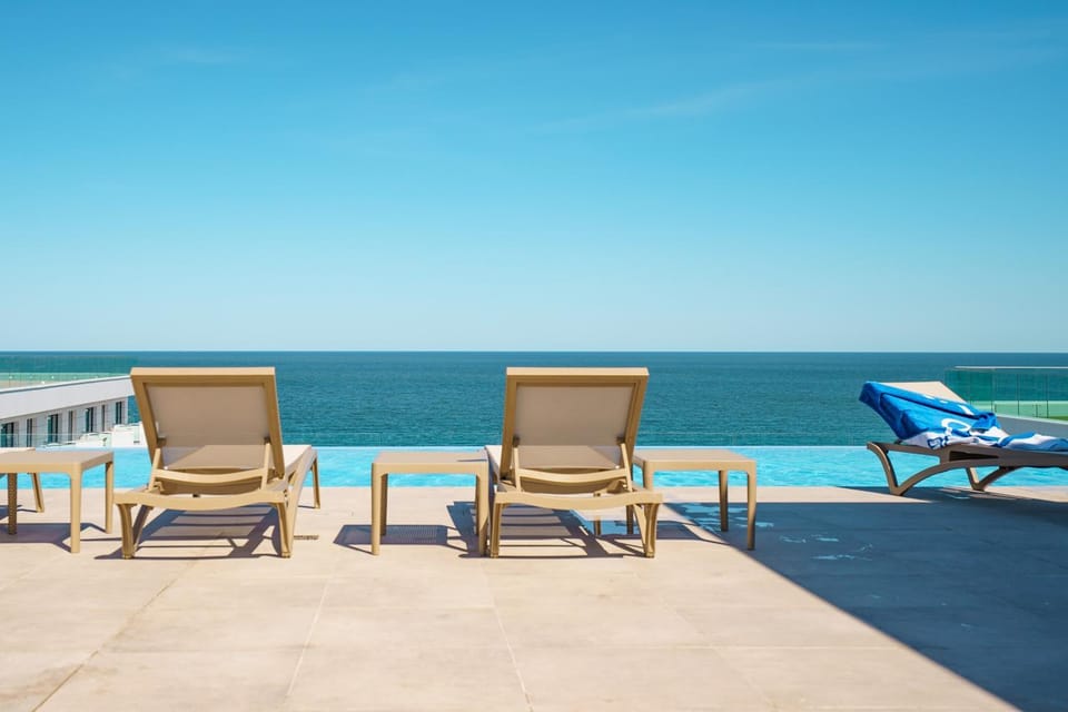 Day, Natural landscape, Beach, Sea view, Swimming pool, sunbed