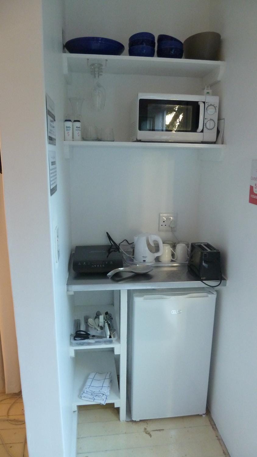 Kitchen or kitchenette, stove, toaster