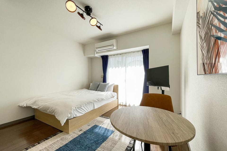 Bed, TV and multimedia, Seating area, Bedroom, air conditioner