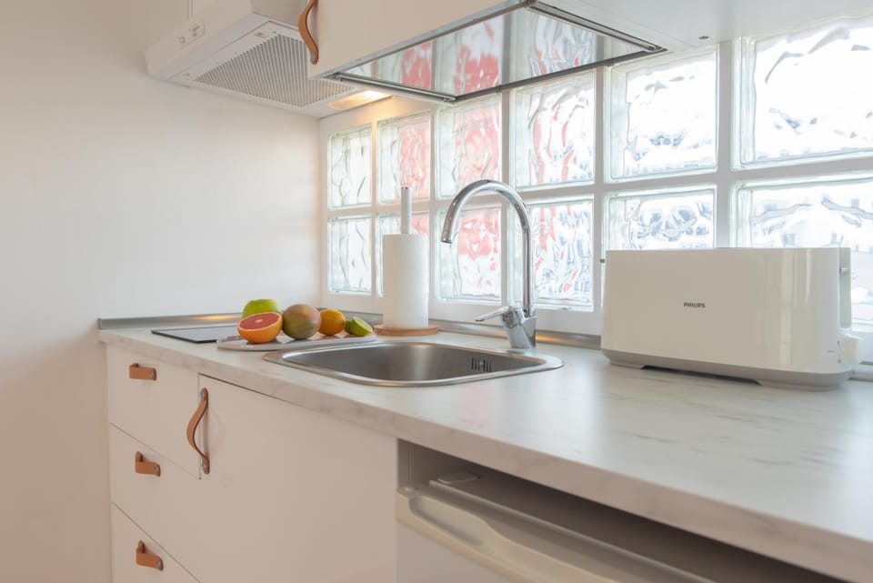 Kitchen or kitchenette, stove, toaster