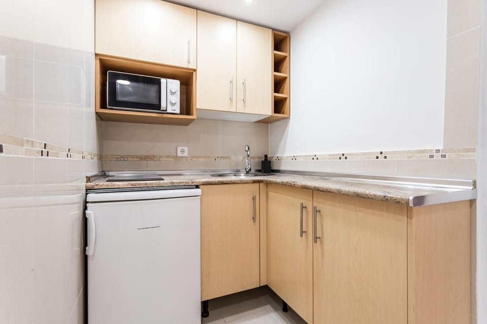 Kitchen or kitchenette, stove