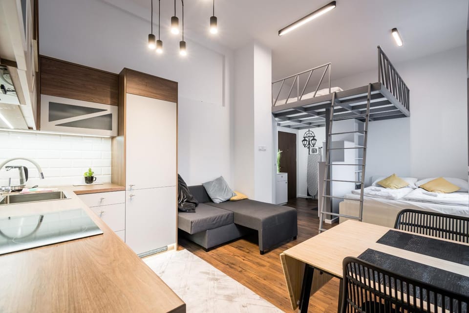 Bed, Kitchen or kitchenette, Living room, Seating area, Bedroom