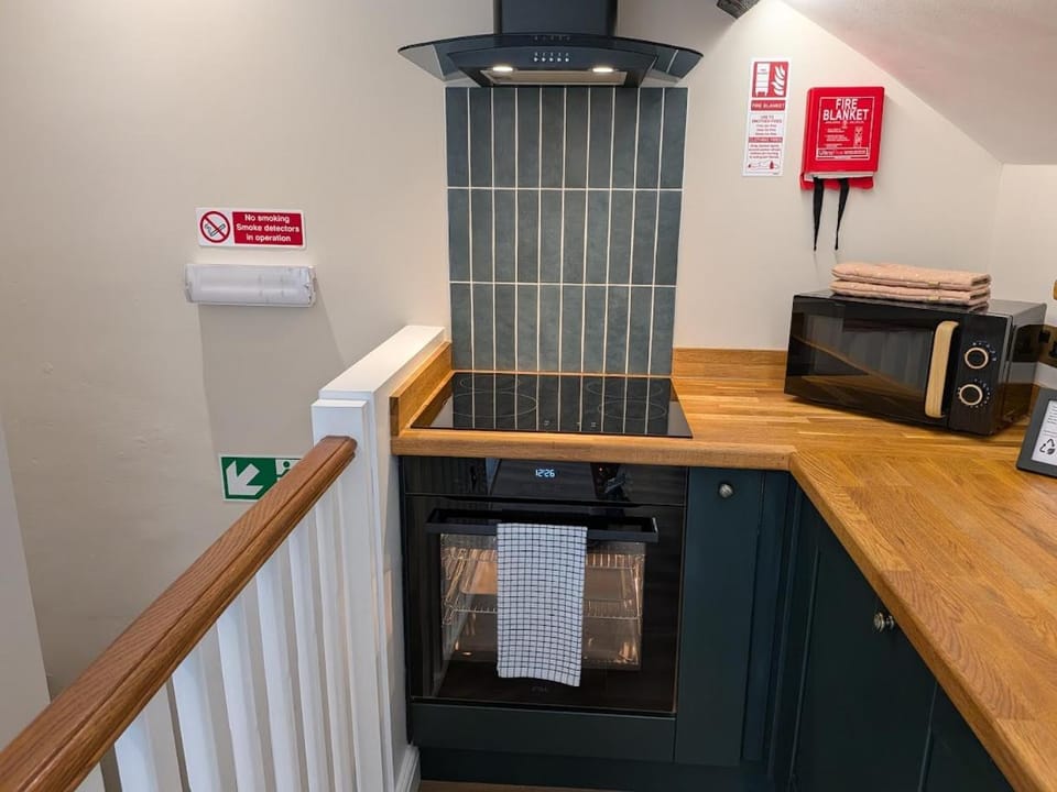 Kitchen or kitchenette, stove