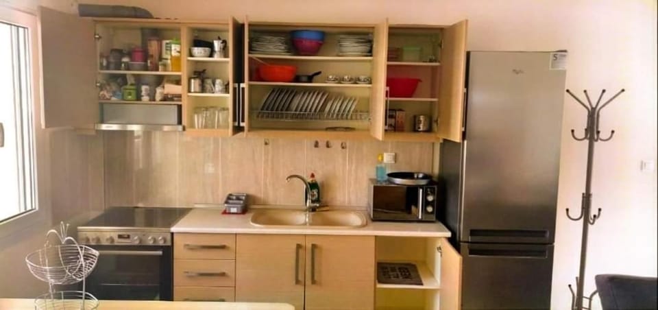 Kitchen or kitchenette, microwave, oven, stove, toaster
