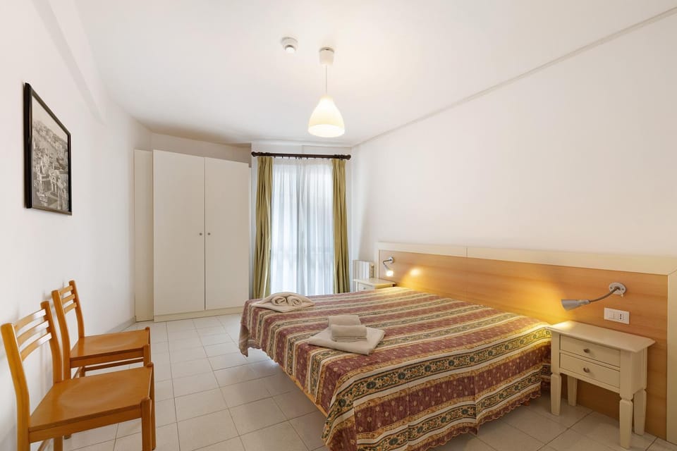 Property building, Living room, Bedroom