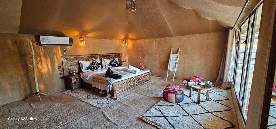 Photo of the whole room, Seating area, Bedroom, towels, air conditioner