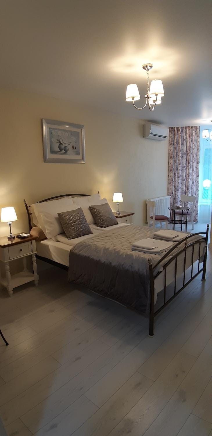 Bed, Living room, Seating area, Bedroom