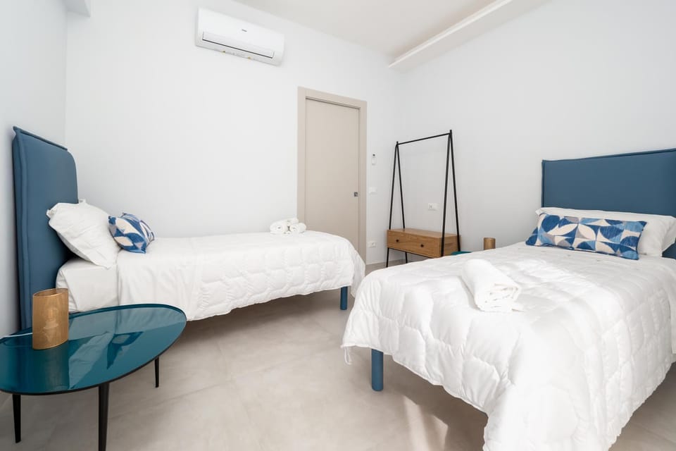 Bed, Photo of the whole room, Bedroom, towels, wardrobe, air conditioner