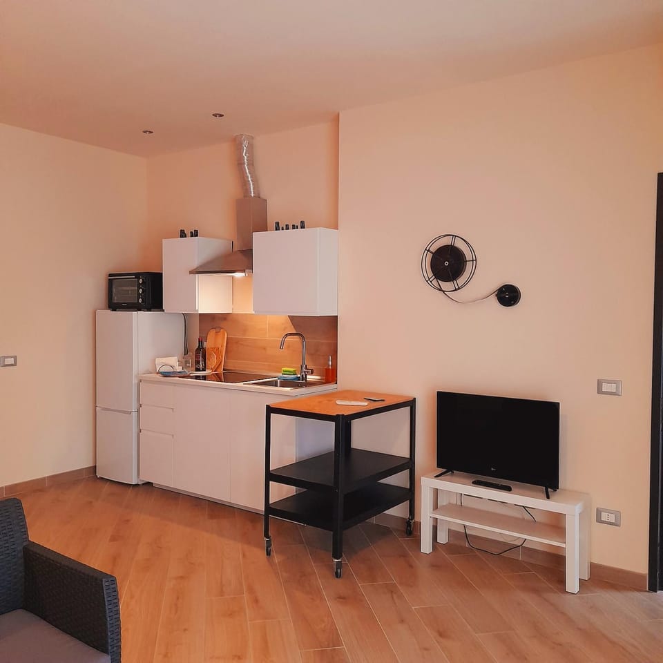 Kitchen or kitchenette, Living room, stove