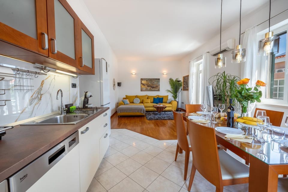 Living room, Dining area, dishwasher, oven, stove