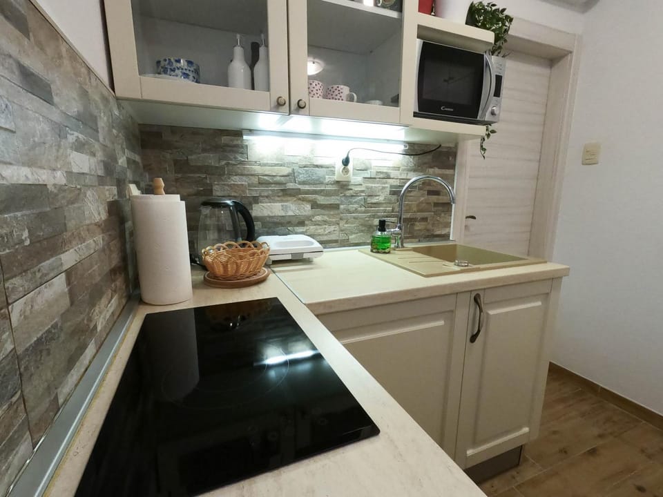 Kitchen or kitchenette, stove
