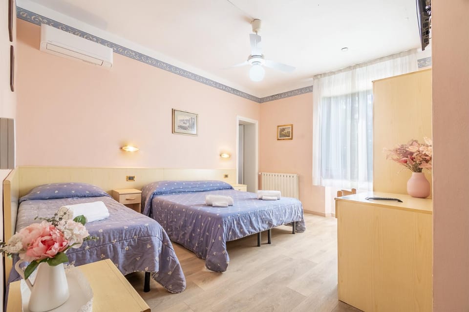 Photo of the whole room, Bedroom, towels, air conditioner