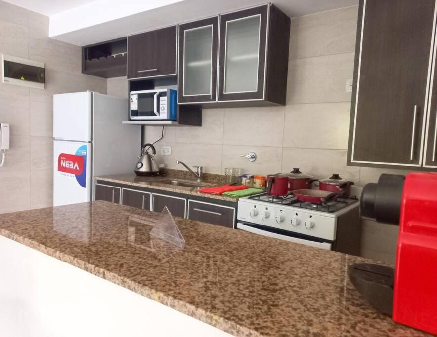 Kitchen or kitchenette, minibar, stove