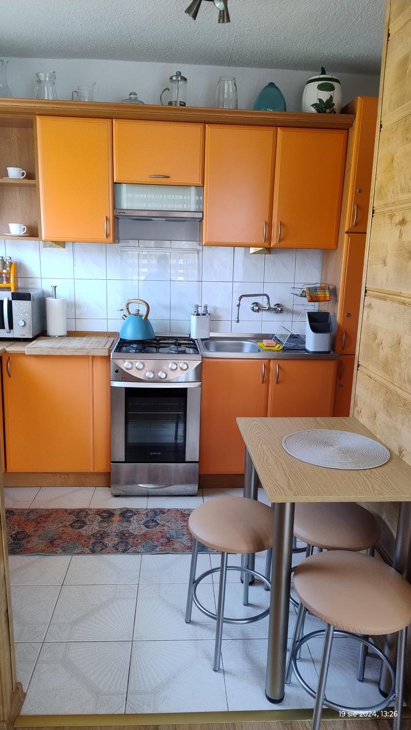 Kitchen or kitchenette, microwave, oven, toaster
