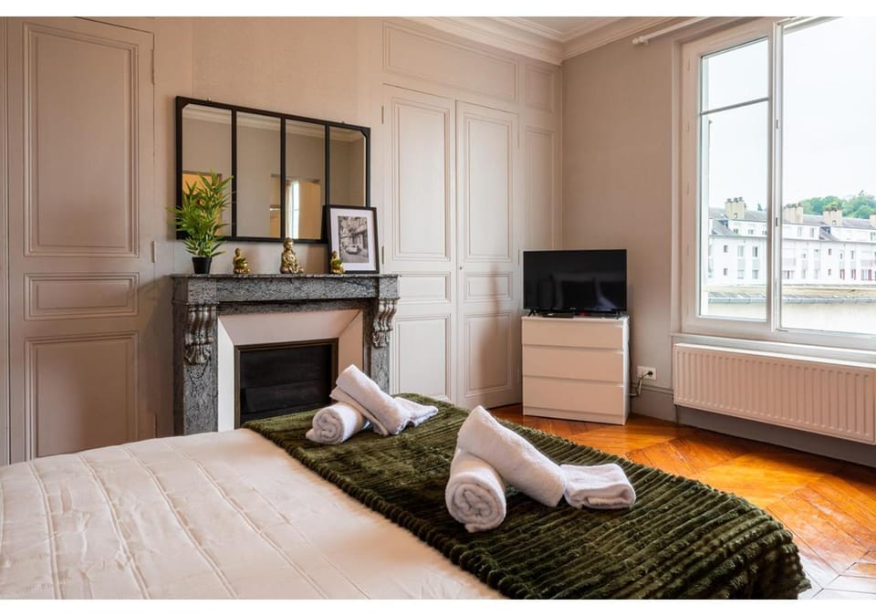 Bed, hair dresser, towels, towels