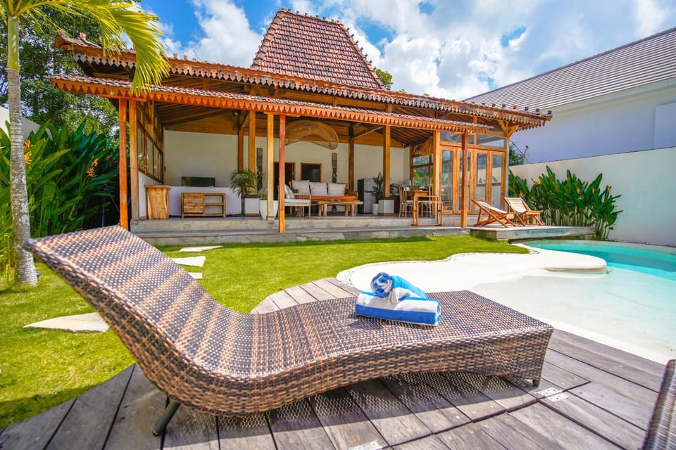Property building, Patio, Day, Garden, Living room, Seating area, Garden view, Pool view, Swimming pool, sunbed