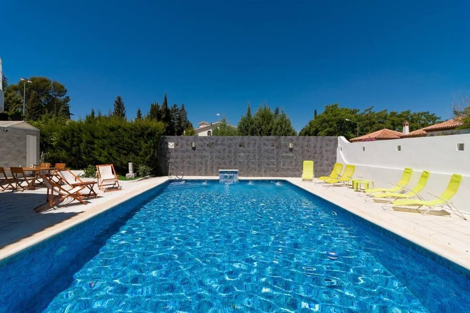 Swimming pool, sunbed