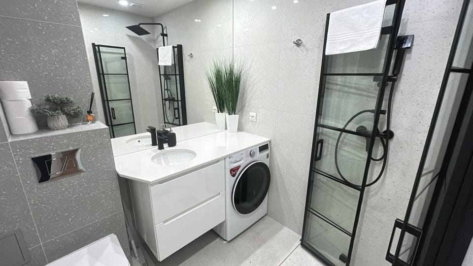Shower, Bathroom, towels, washing machine, dryer