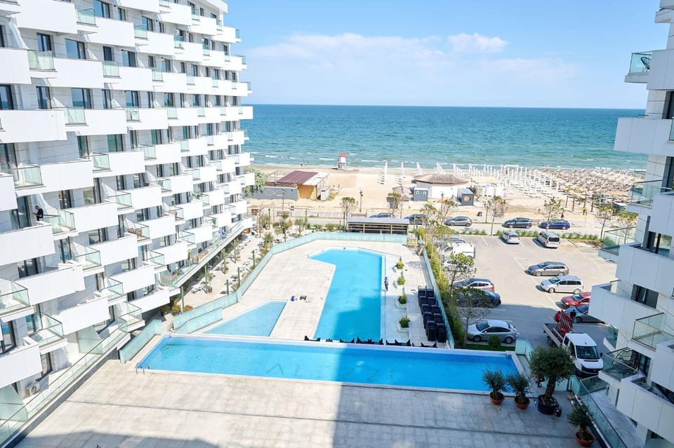 Property building, Day, Pool view, Sea view
