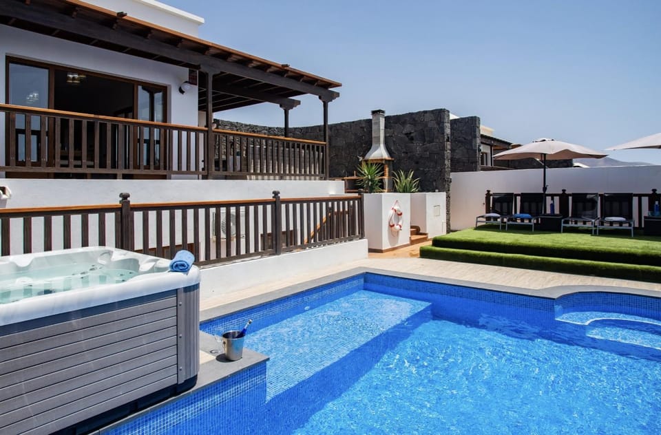 Property building, Living room, Swimming pool