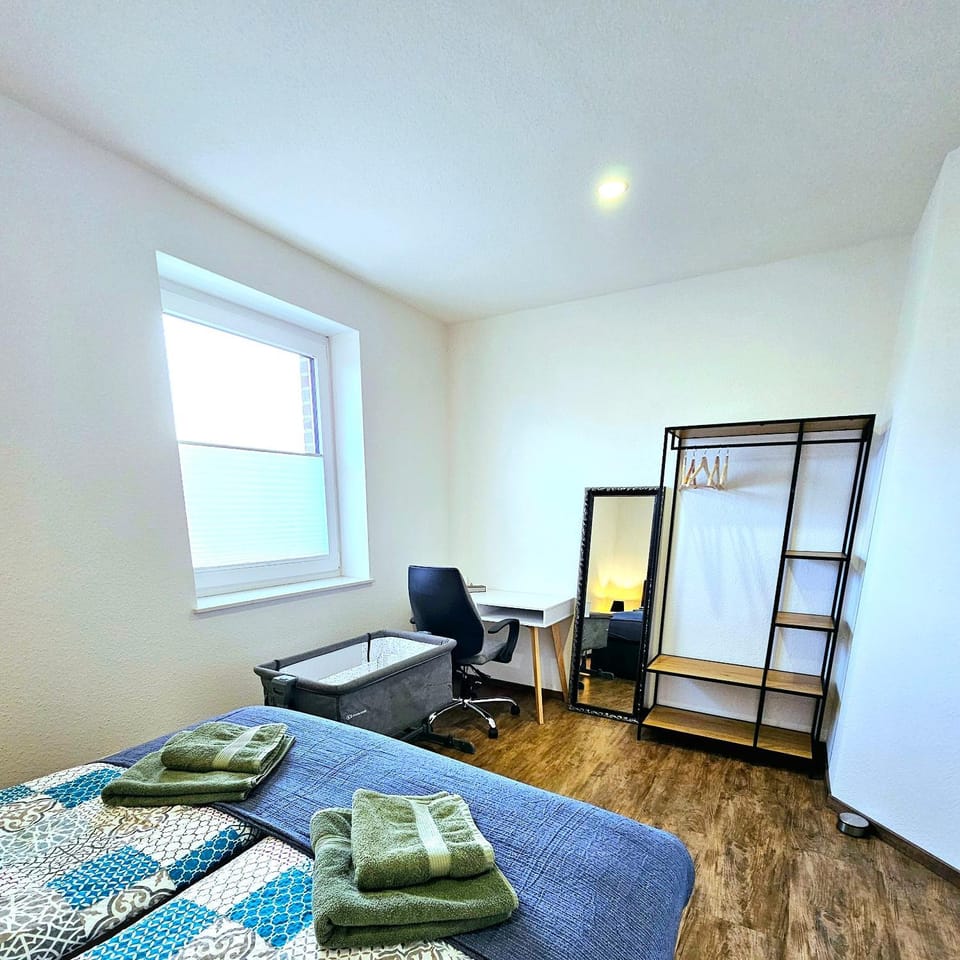 Bed, Seating area, Bedroom, hair dresser, towels