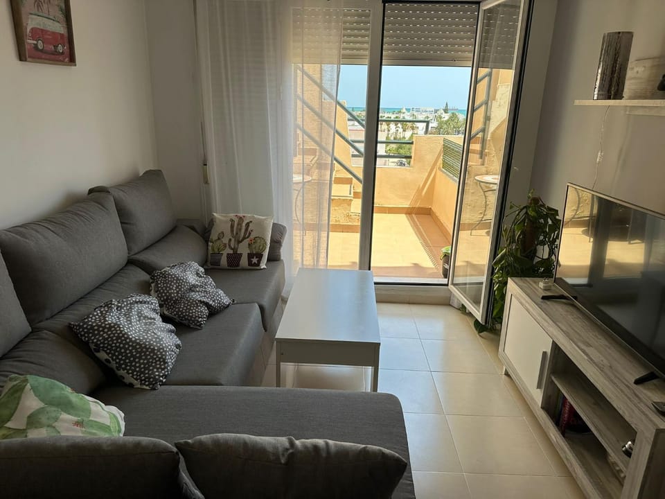 Communal lounge/ TV room, Living room, Seating area, Sea view