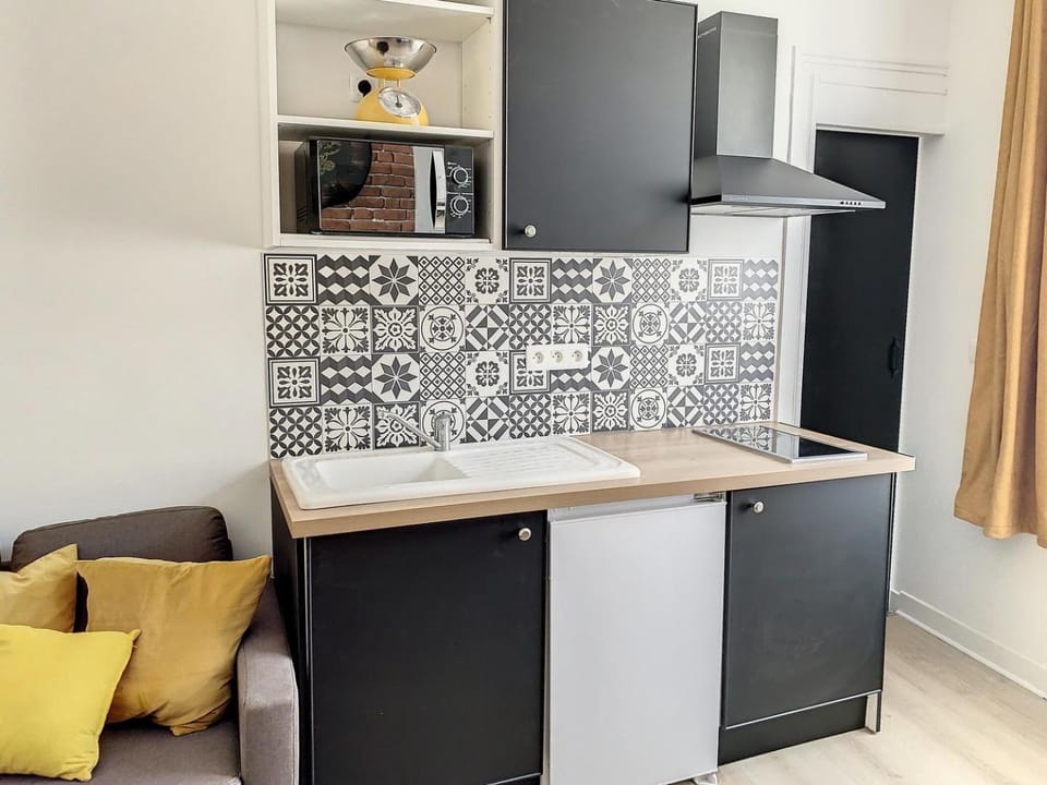 Kitchen or kitchenette, stove
