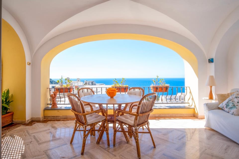 Natural landscape, View (from property/room), Balcony/Terrace, Living room, Seating area, Dining area, Sea view