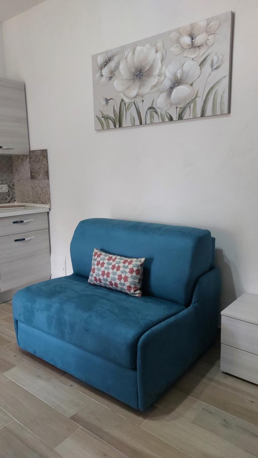 Camera con angolo cottura House in Sardinia