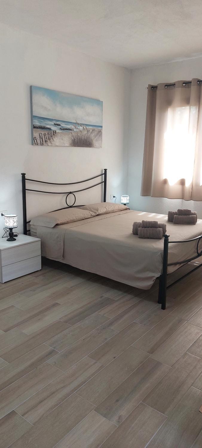 Camera con angolo cottura House in Sardinia