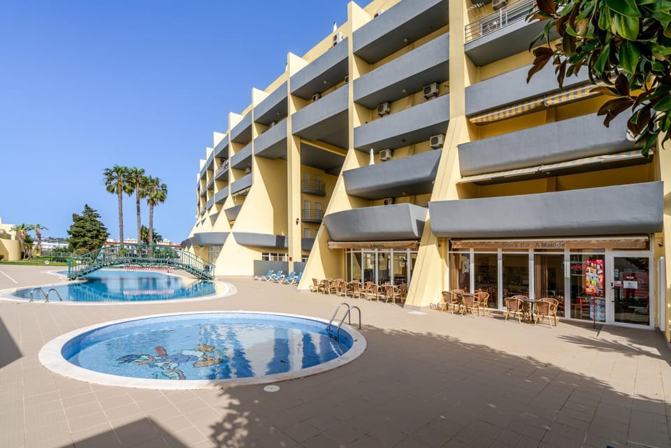 Property building, Restaurant/places to eat, Swimming pool