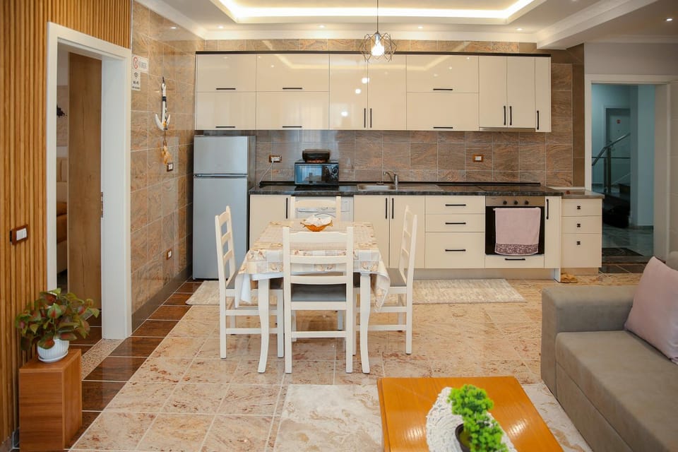 Kitchen or kitchenette, Living room, Seating area, Dining area, dishwasher, minibar, oven, stove, toaster, kitchen