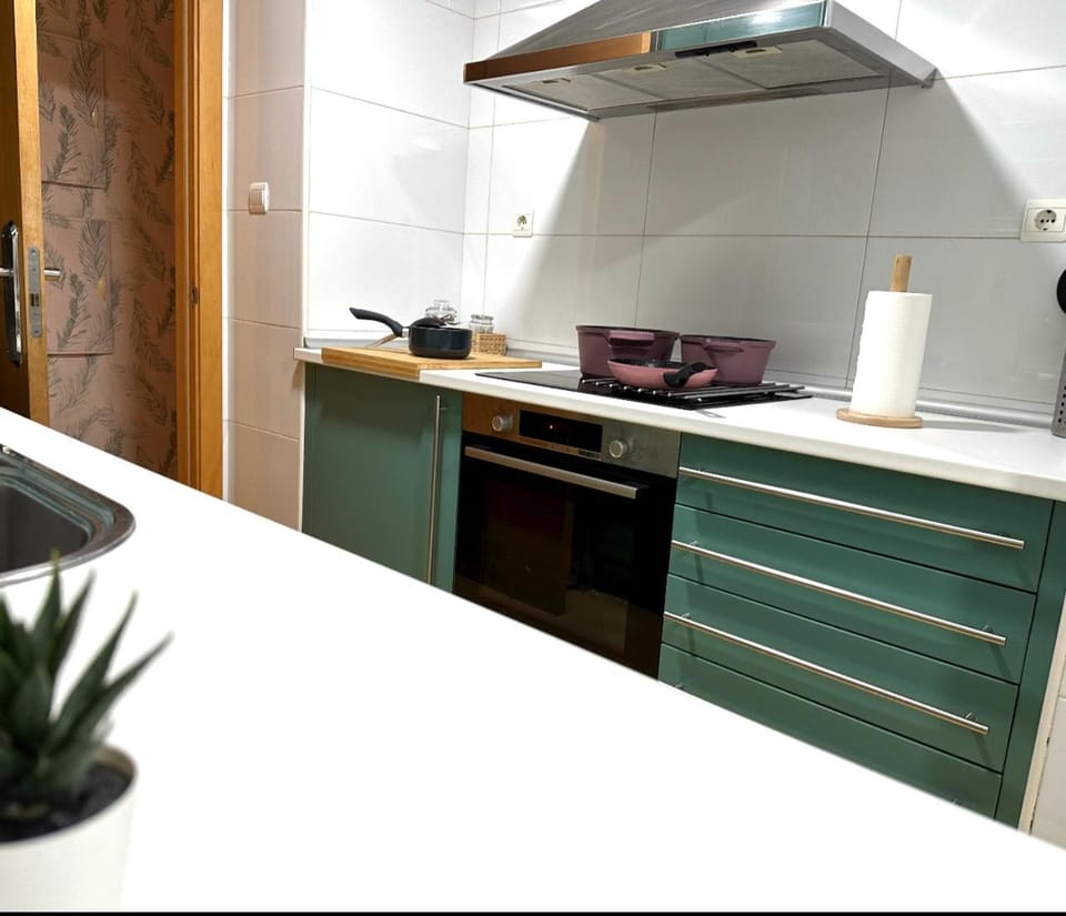 Kitchen or kitchenette, oven, stove