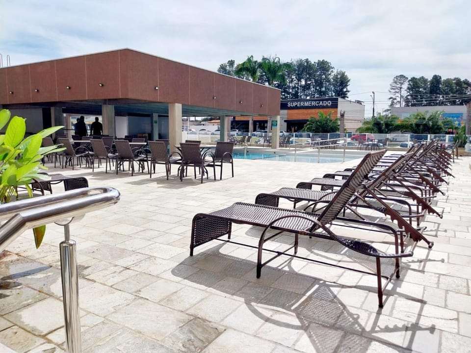 Property building, Lounge or bar, Pool view, sunbed