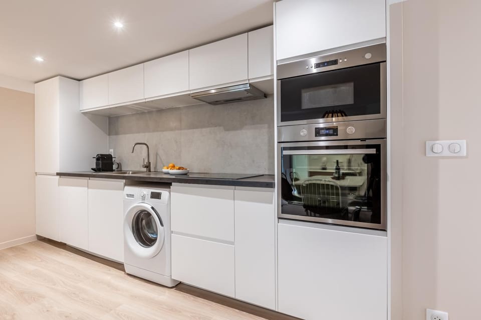 Kitchen or kitchenette, washing machine