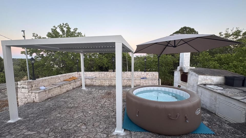 Property building, Patio, BBQ facilities, Swimming pool